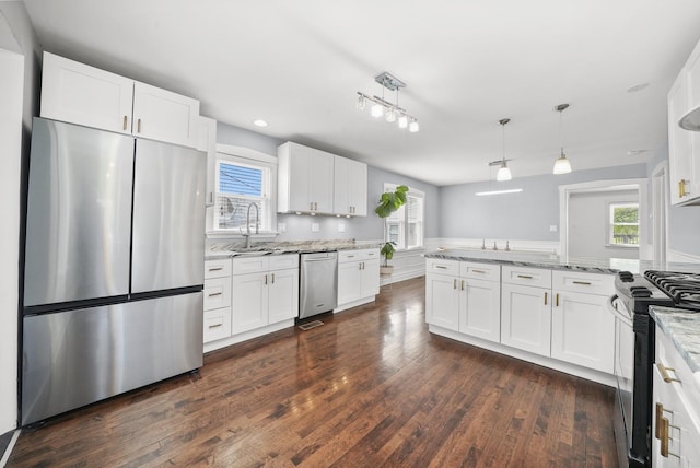4301 N Melvina Ave, Chicago, IL 60634 - kitchen featuring stainless steel appliances, a sink, dark wood-style floors, white cabinetry, and recessed lighting