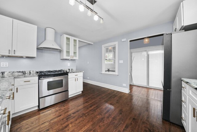 4301 N Melvina Ave, Chicago, IL 60634 - kitchen with custom exhaust hood, appliances with stainless steel finishes, light stone countertops, dark wood-style floors, and glass insert cabinets