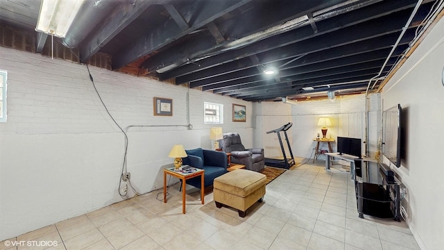 below grade area featuring tile patterned flooring