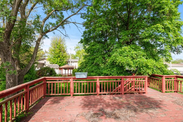 wooden deck with a gazebo