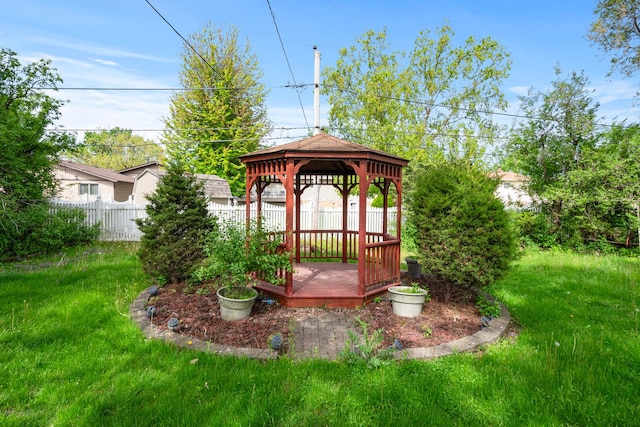 view of yard featuring a gazebo and a wooden deck