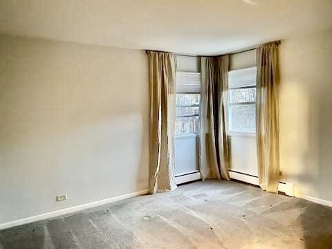 20779 N Elizabeth Ave, Lincolnshire, IL 60069 - empty room featuring baseboards