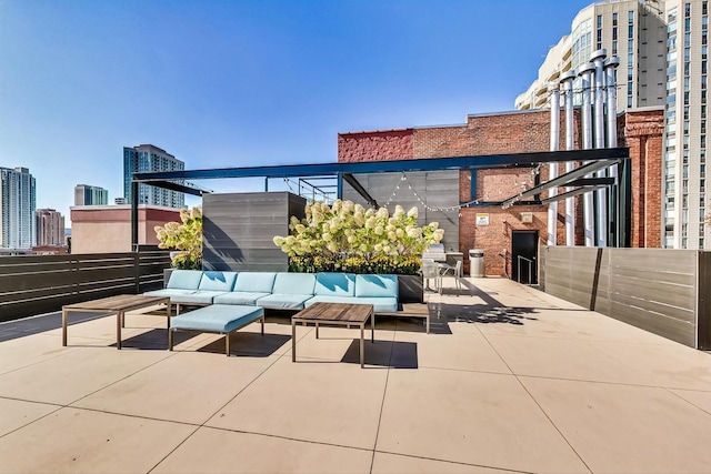 411 W Ontario St Unit 311, Chicago, IL 60654 - view of patio / terrace with an outdoor living space, cooling unit, and a city view