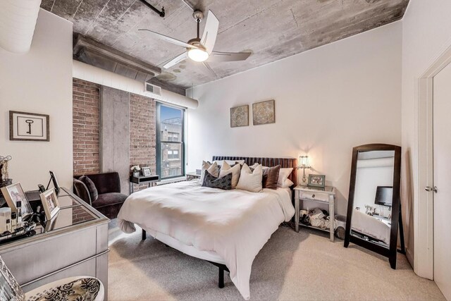 411 W Ontario St Unit 311, Chicago, IL 60654 - bedroom with a ceiling fan, light carpet, brick wall, and visible vents