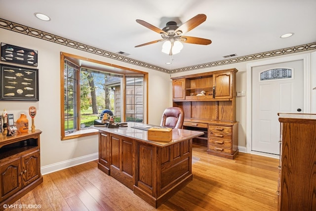 office featuring baseboards, a ceiling fan, light wood-style floors, and recessed lighting