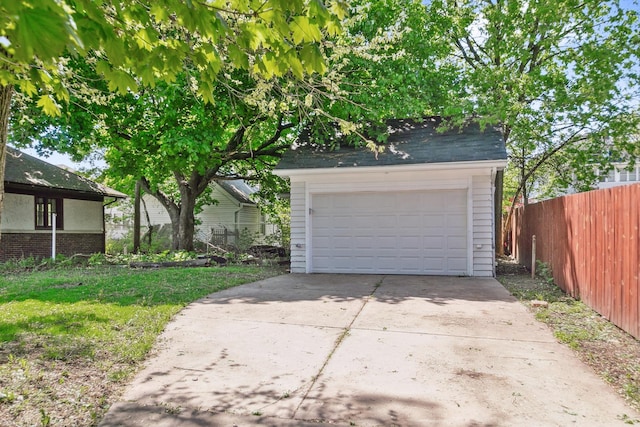 detached garage with fence