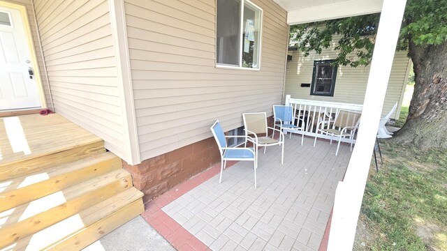 301 N W Ave, Kankakee, IL 60901 - view of front of home featuring covered porch