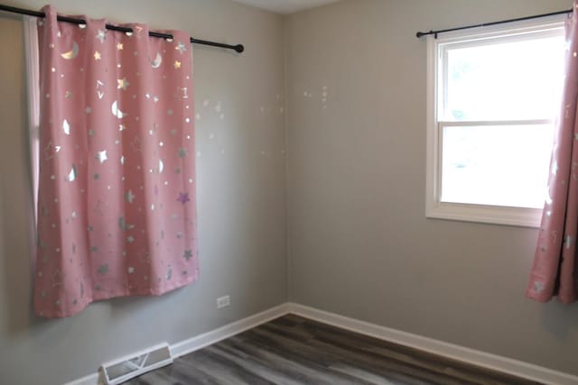 4627 Custer Ave, Lyons, IL 60534 - unfurnished room featuring baseboards and wood finished floors