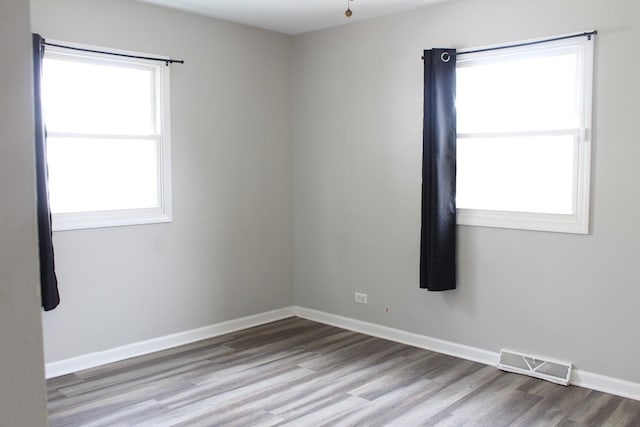 4627 Custer Ave, Lyons, IL 60534 - spare room featuring wood finished floors and baseboards