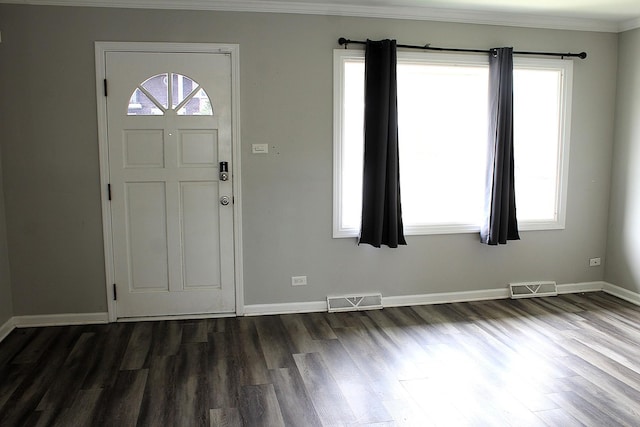 4627 Custer Ave, Lyons, IL 60534 - foyer featuring dark wood finished floors, crown molding, and baseboards