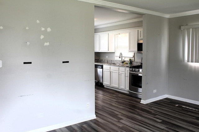 4627 Custer Ave, Lyons, IL 60534 - kitchen featuring stainless steel appliances, a sink, ornamental molding, dark wood-type flooring, and white cabinetry