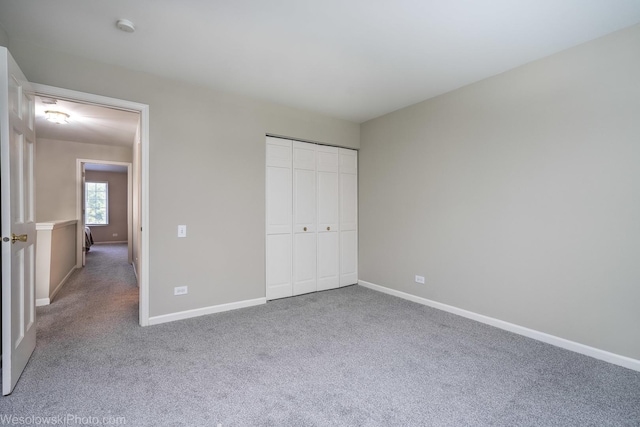 434 Locksley Dr, Streamwood, IL 60107 - unfurnished bedroom featuring carpet, baseboards, and a closet