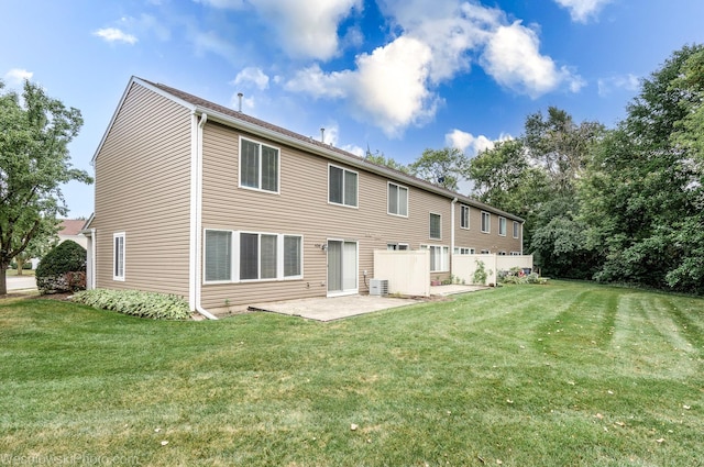 434 Locksley Dr, Streamwood, IL 60107 - rear view of house with a patio area and a lawn