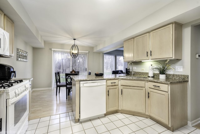 434 Locksley Dr, Streamwood, IL 60107 - kitchen with a notable chandelier, light brown cabinets, white appliances, a sink, and a peninsula