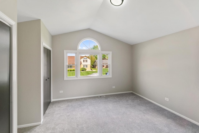 3618 Ronald Rd, Crete, IL 60417 - carpeted spare room featuring lofted ceiling and baseboards