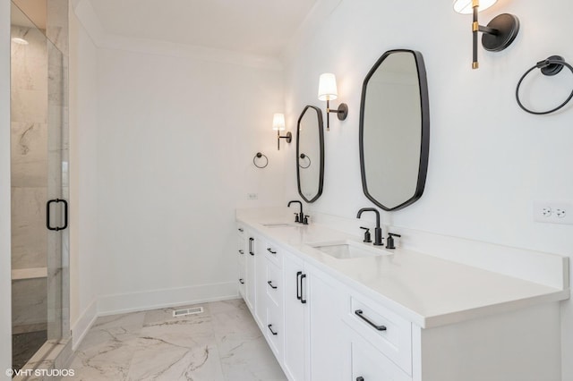 full bath featuring a shower stall, marble finish floor, baseboards, and a sink