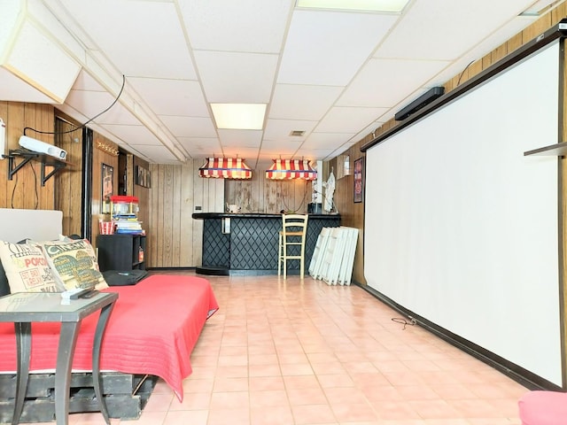 372 55th St, Clarendon Hills, IL 60514 - bedroom featuring wooden walls, a paneled ceiling, and baseboards
