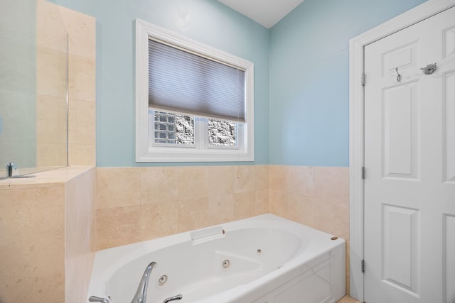 full bath with a jetted tub