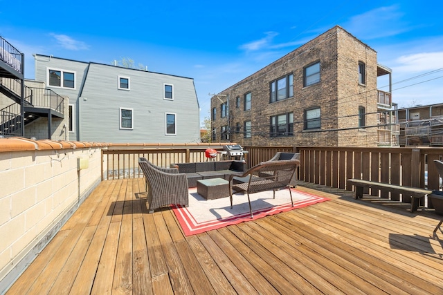 wooden deck featuring an outdoor living space