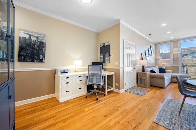 office featuring light wood-style flooring, ornamental molding, baseboards, and recessed lighting