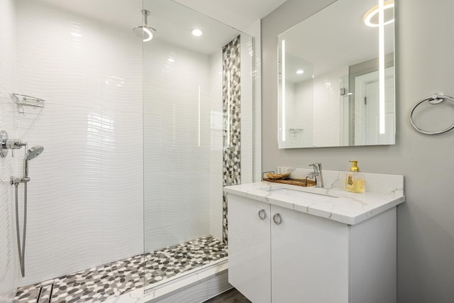 200 Marshall Dr, Des Plaines, IL 60016 - full bathroom with recessed lighting, tiled shower, and vanity