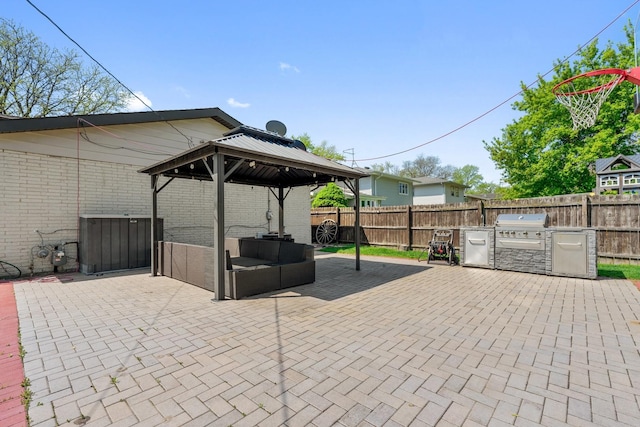 200 Marshall Dr, Des Plaines, IL 60016 - view of patio / terrace featuring a gazebo, a fenced backyard, an outdoor living space, and an outdoor kitchen