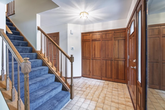 1494 Applegate Dr, Naperville, IL 60565 - entrance foyer with stairs, light tile patterned flooring, and baseboards