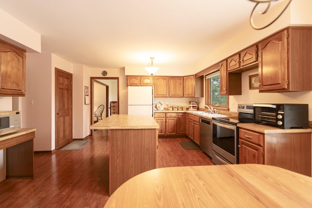 1494 Applegate Dr, Naperville, IL 60565 - kitchen featuring appliances with stainless steel finishes, light countertops, dark wood-style floors, and a kitchen island
