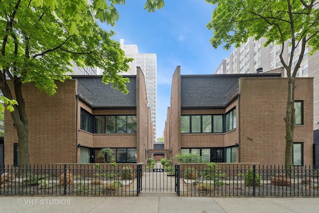view of property with a fenced front yard