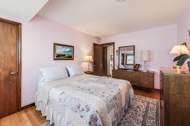 bedroom featuring light wood-type flooring