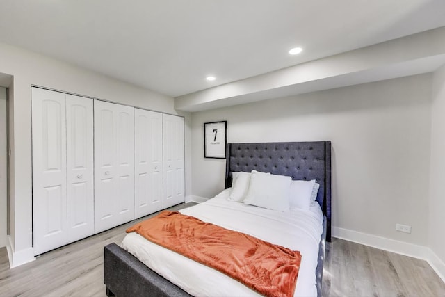 110 S Dunton Ave Unit 2C, Arlington Heights, IL 60005 - bedroom featuring light wood finished floors, baseboards, recessed lighting, and a closet