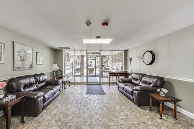 110 S Dunton Ave Unit 2C, Arlington Heights, IL 60005 - building lobby featuring a decorative wall and a wall of windows