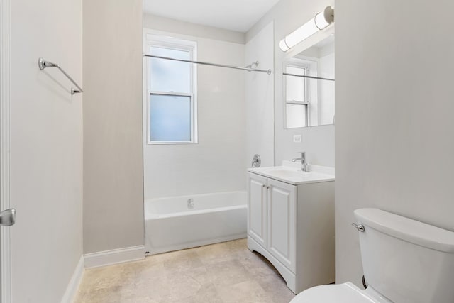 full bathroom with toilet, vanity, and shower / washtub combination