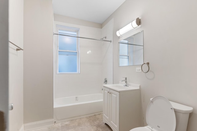 bathroom with toilet, vanity, and shower / bath combination