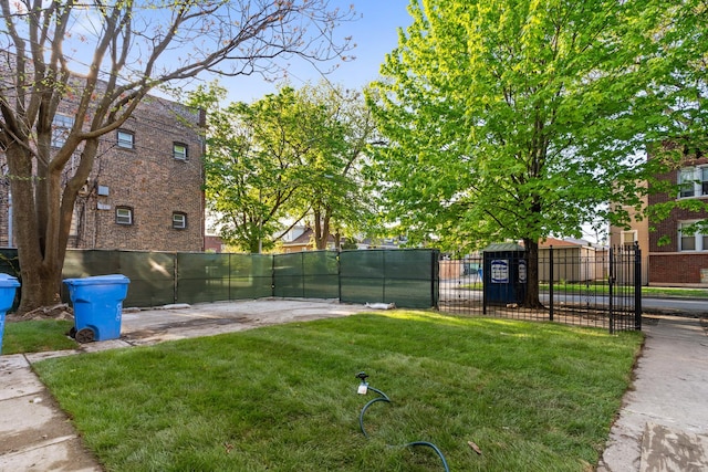 view of yard with a gate