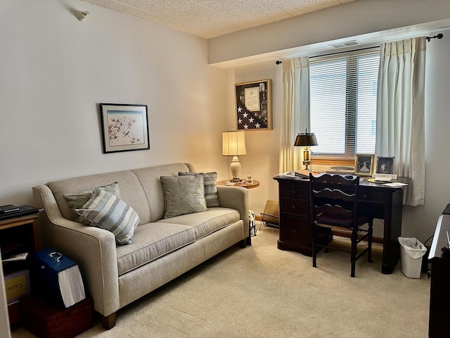 carpeted living area featuring a textured ceiling and visible vents