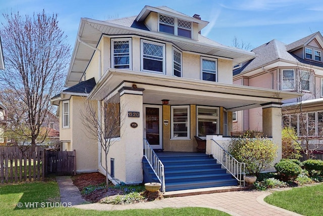 620 S Elmwood Ave, Oak Park, IL 60304 - traditional style home with a chimney, a porch, stucco siding, and fence