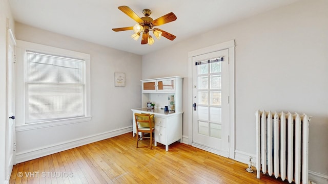 620 S Elmwood Ave, Oak Park, IL 60304 - office space featuring radiator, baseboards, light wood-style flooring, and a ceiling fan