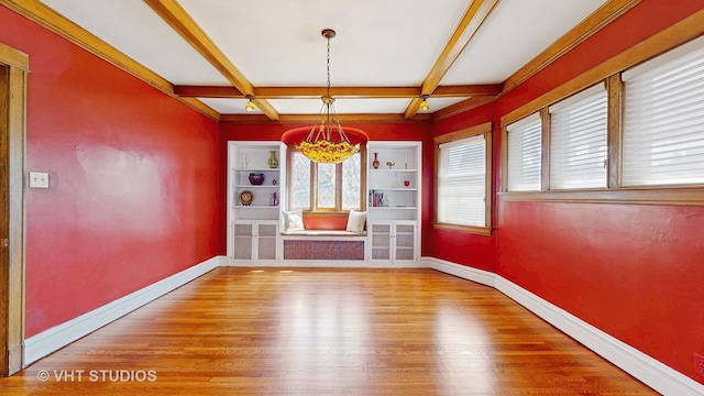 620 S Elmwood Ave, Oak Park, IL 60304 - unfurnished dining area with baseboards, beam ceiling, coffered ceiling, and wood finished floors