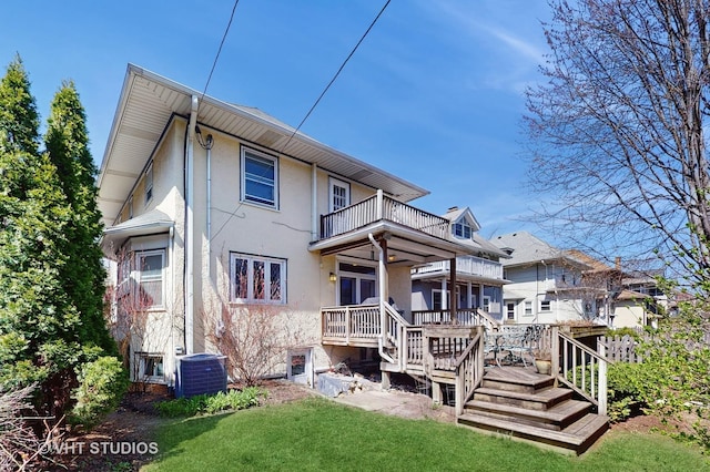 620 S Elmwood Ave, Oak Park, IL 60304 - back of house with a balcony, stucco siding, a wooden deck, a lawn, and central AC unit