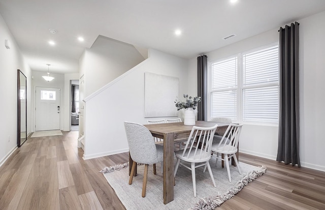 109 N Van Nortwick Ave, Batavia, IL 60510 - dining space featuring light wood-style flooring, stairway, baseboards, and recessed lighting