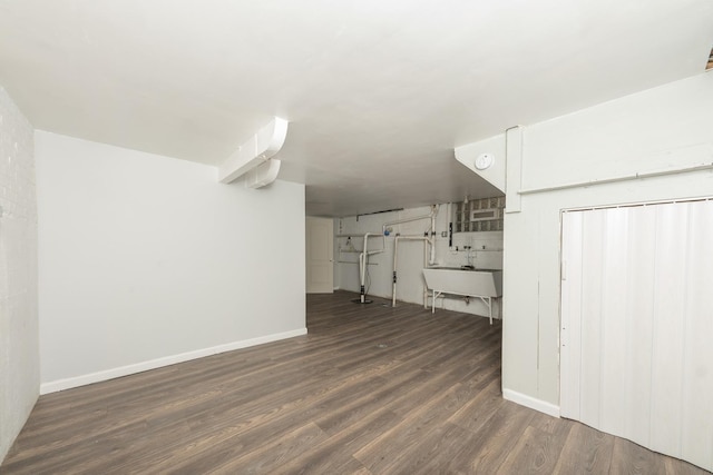 8007 S Houston Ave, Chicago, IL 60617 - basement with wood finished floors, baseboards, and a sink