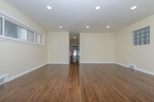 8007 S Houston Ave, Chicago, IL 60617 - empty room with recessed lighting, dark wood-style flooring, and baseboards