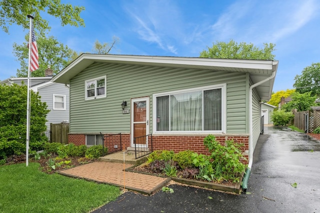 646 W Babcock Ave, Elmhurst, IL 60126 - view of front of house with brick siding and driveway