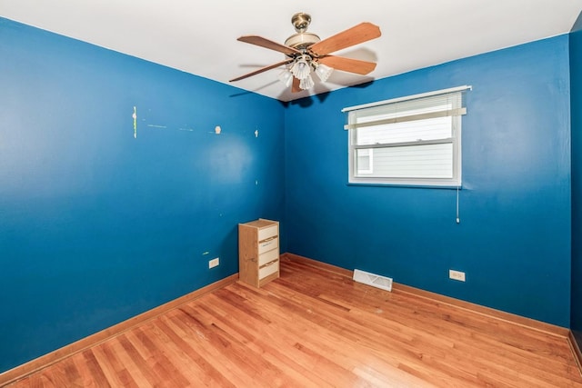 646 W Babcock Ave, Elmhurst, IL 60126 - unfurnished room with ceiling fan, wood finished floors, and baseboards