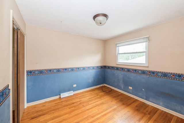 646 W Babcock Ave, Elmhurst, IL 60126 - unfurnished room featuring wood finished floors and baseboards