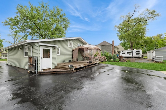 646 W Babcock Ave, Elmhurst, IL 60126 - view of front facade featuring a deck, a gazebo, and central AC