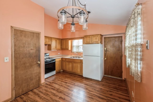 646 W Babcock Ave, Elmhurst, IL 60126 - kitchen featuring gas range oven, freestanding refrigerator, a sink, lofted ceiling, and wood finished floors