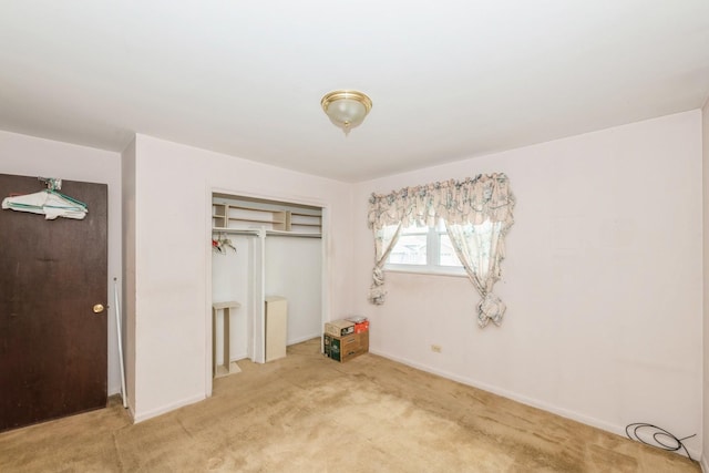 646 W Babcock Ave, Elmhurst, IL 60126 - unfurnished bedroom featuring light colored carpet, a closet, and baseboards