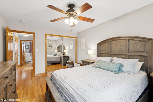 bedroom featuring light wood finished floors, a closet, and a ceiling fan